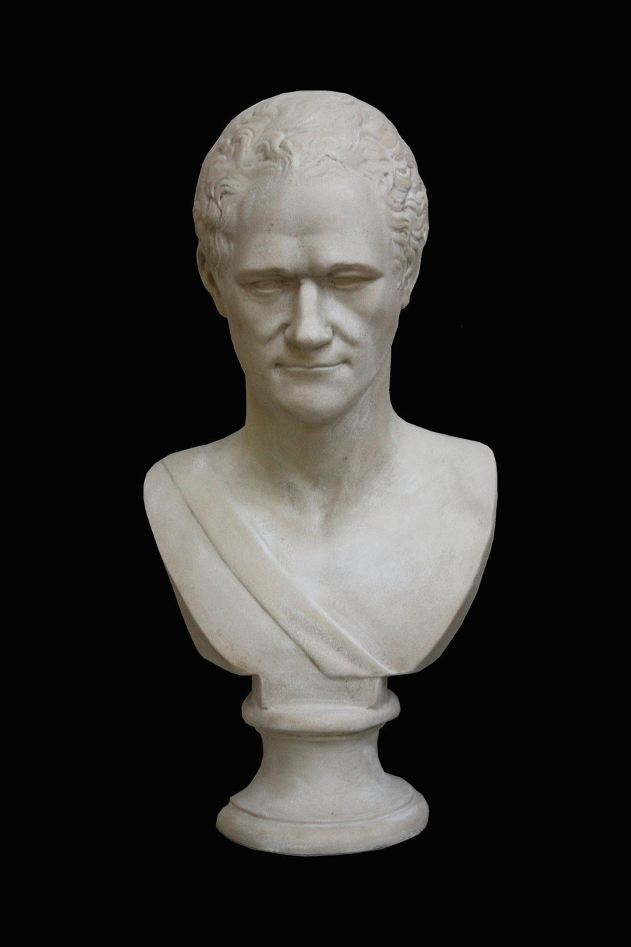 photo with black background of plaster cast bust of Alexander Hamilton