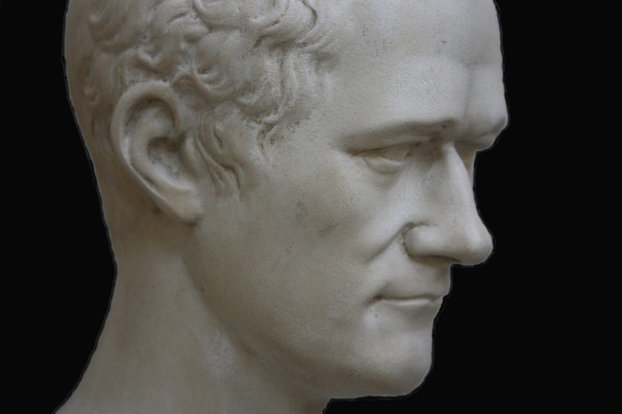 photo closeup with black background of plaster cast bust of Alexander Hamilton