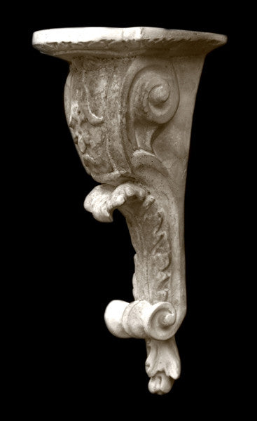 Photo of plaster sculptural ornament from the Renaissance on a black background