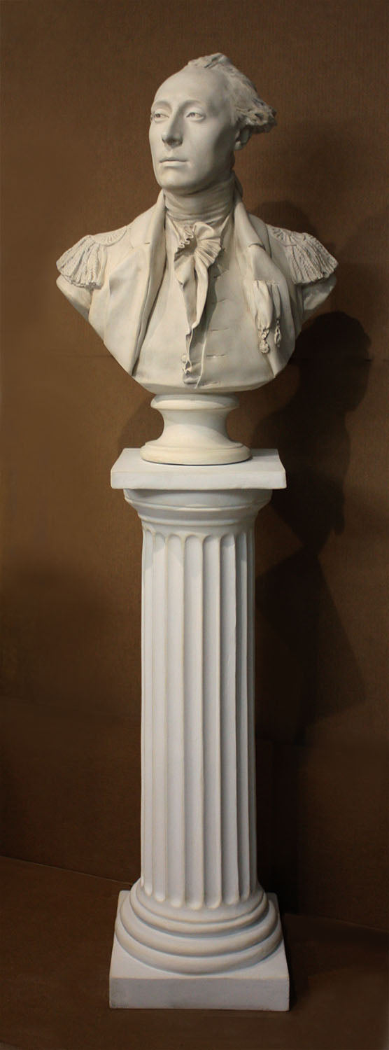 photo of plaster cast of male bust sculpture, namely Lafayette, in uniform on a Doric-like pedestal with brown background