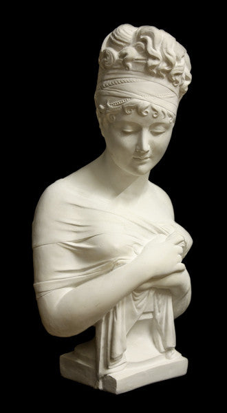photo with black background of plaster cast sculpture bust of Madame Recamier with high up-do and ribbon over forehead and hands crossed over chest covered in cloth