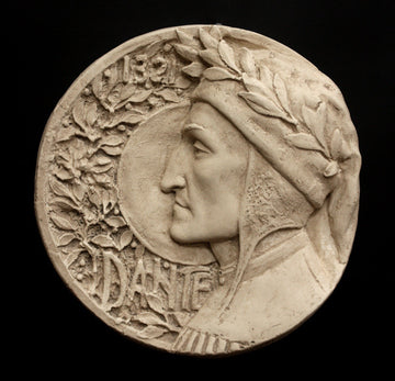 photo of plaster cast of small medallion with male portrait, namely Dante Alighieri, in profile and floral decoration on the left side curve and the word Dante, on black background