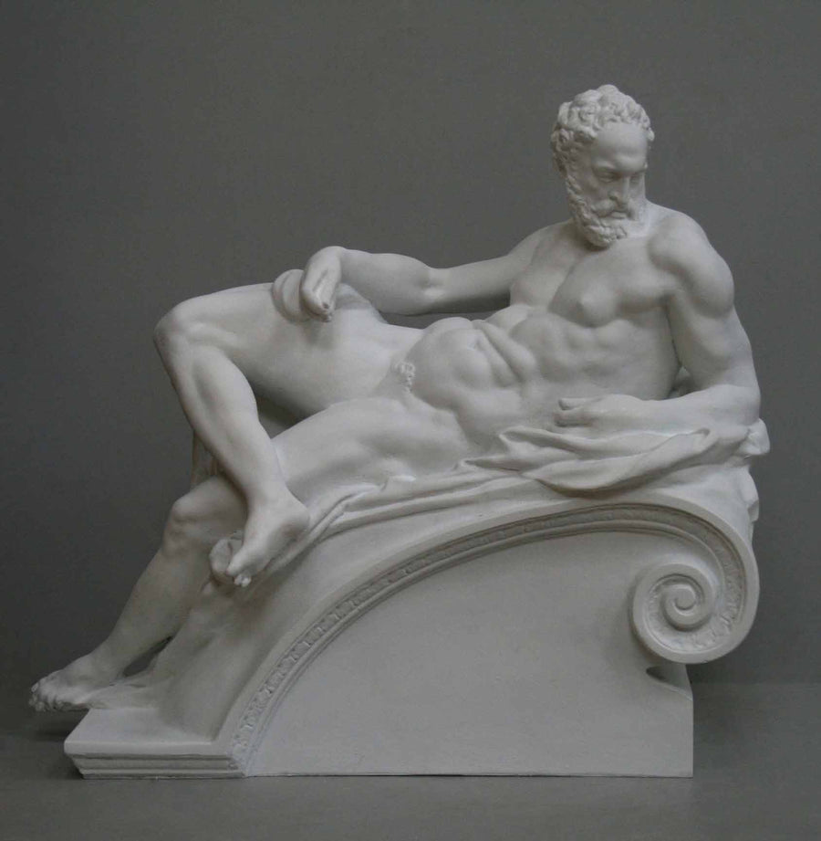 photo of plaster cast of reclining male nude with a gray background