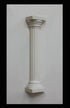 photo of plaster cast sculpture of Greek half column on a white panel