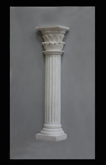 photo of plaster cast sculpture of Greek half column on a white panel