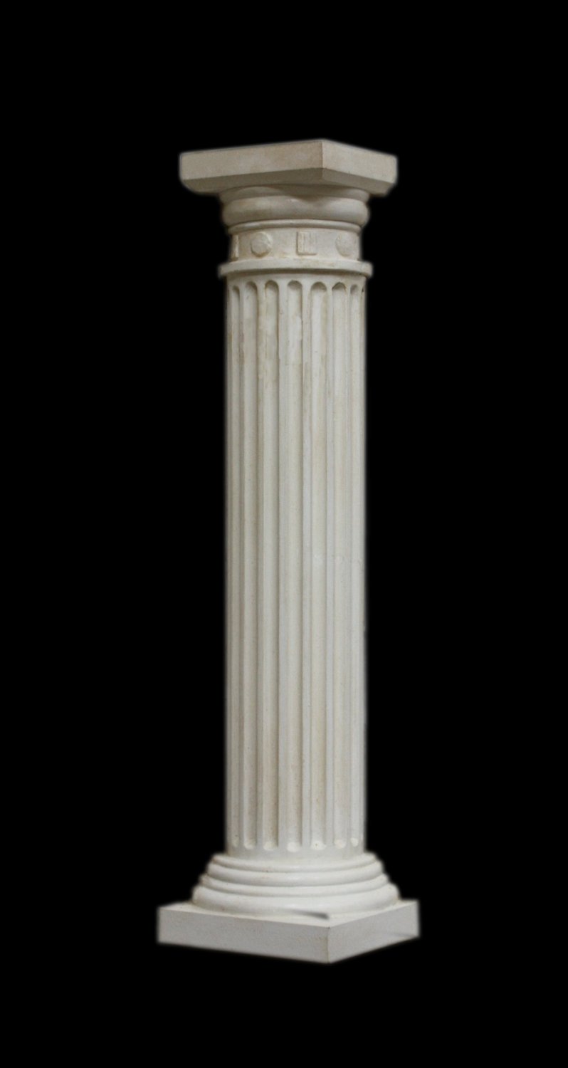 photo with black background of plaster cast sculpture of Greek half column