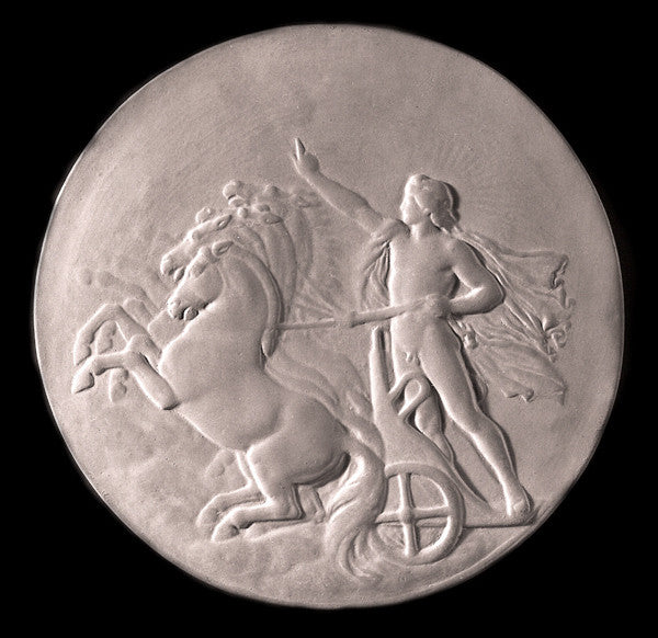 black and white photo of plaster cast relief sculpture of nude male figure in horse-drawn chariot flying