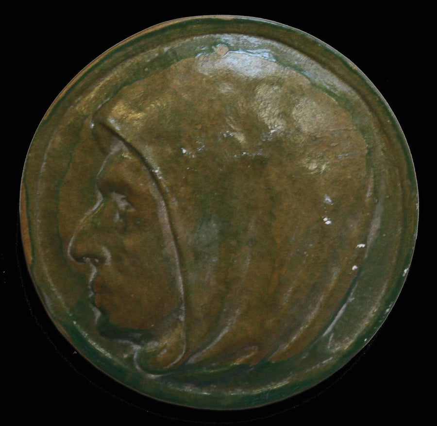 photo of painted green plaster cast of relief with man's portrait, namely Savonarola, in profile with a black background