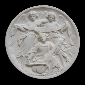 photo of plaster cast relief of three angels, two holding a long scroll and one playing a string instrument on a black background