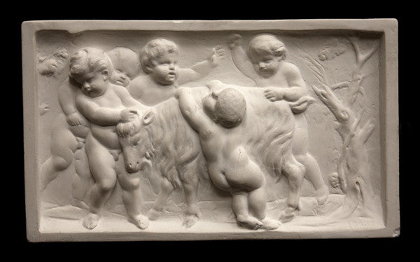 photo of plaster cast relief sculpture of several putti around a goat celebrating the god Bacchus