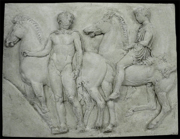 photo of off-white plaster cast relief sculpture of man on horseback and another man beside his horse from Parthenon against black background