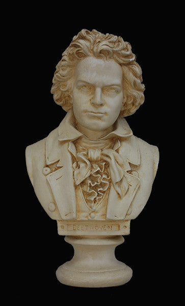 photo of plaster cast sculpture bust of man, namely Beethoven, with suit and ruffled necktie